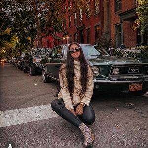 Sweater with braid detail on the front